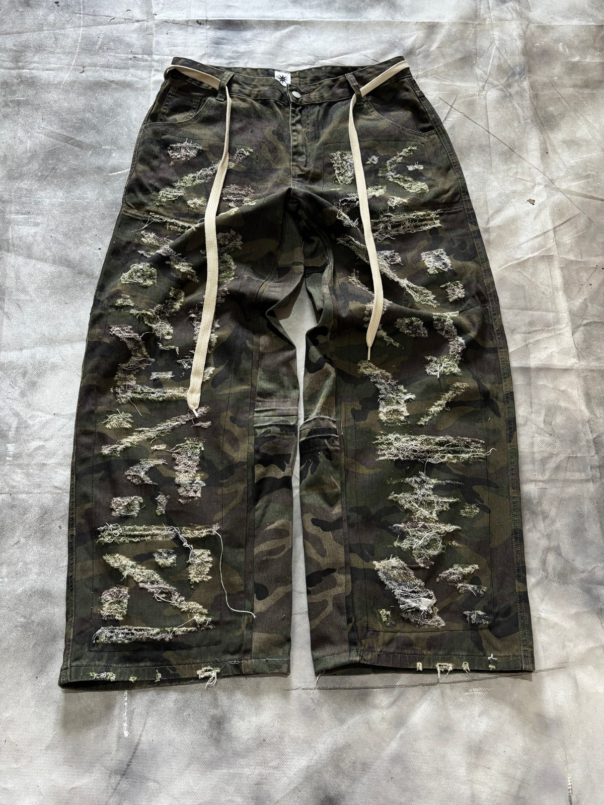 Disstresed Camo Jeans